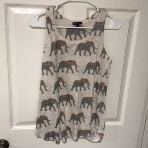 Cream colored tank with elephant design